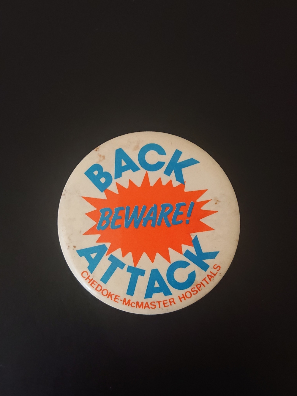Vintage 2" Round Pin Button - Beware! Back Attack - Chedoke-McMaster Hospital